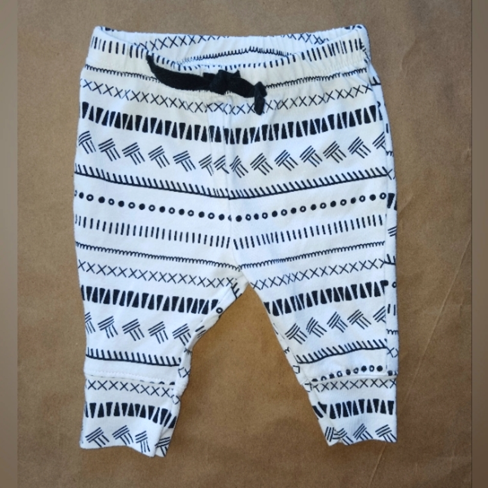 White with black designs pants